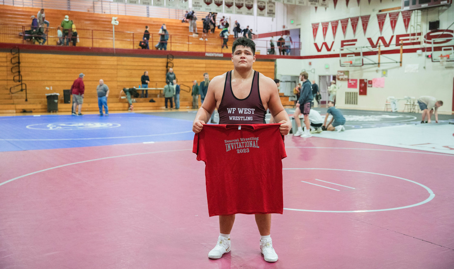 W.F. West senior Daniel Matagi poses for a photo following the Bearcat Invitational and his last home meet in Chehalis Saturday night.